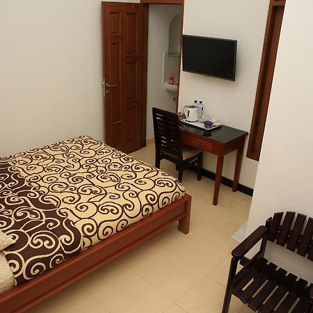 Puri Kusuma Guest House Tabanan  Phòng bức ảnh